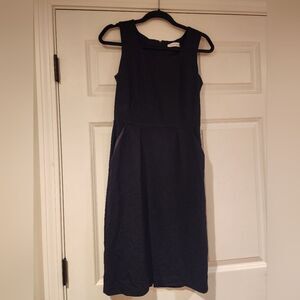Calvin Klein black sleeveless knee length dress with pockets and small belt Loop
